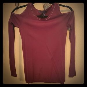 Sweater with shoulder holes